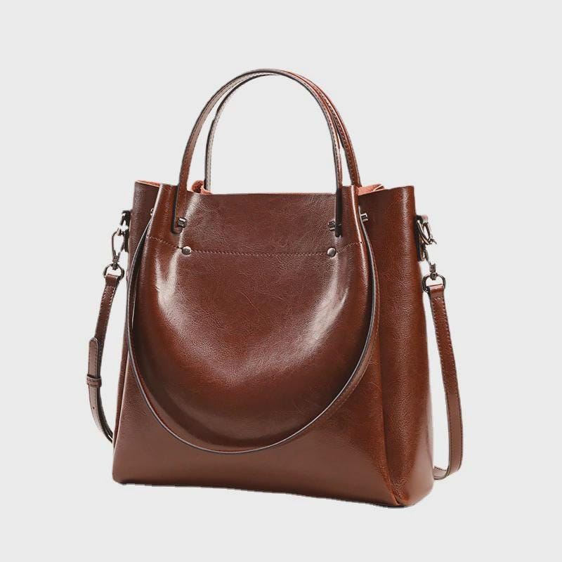 Bolso de cuero moderno formas geométricas, colores intensos, diseño contemporáneo.